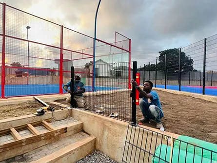 Jinbiao Construction team securing wire mesh guardrails in Ghana, ensuring optimal placement and long-term durability.